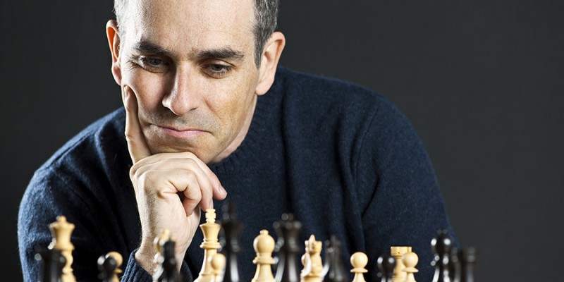 Man at chess board